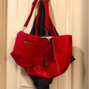 BCBG purse w/ reservable bag and dust bag included.